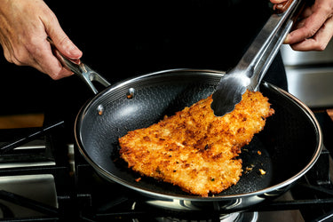 Hard-Anodized vs. Stainless Steel Pans: The Pros & Cons