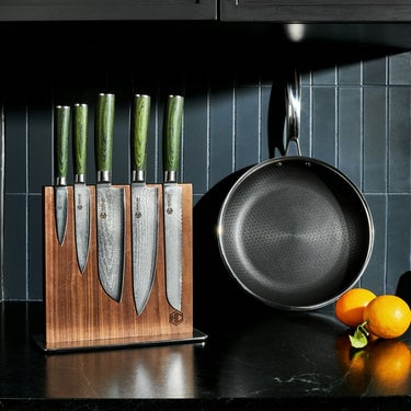 set of kitchen knives from hexclad on a magnetic knife block